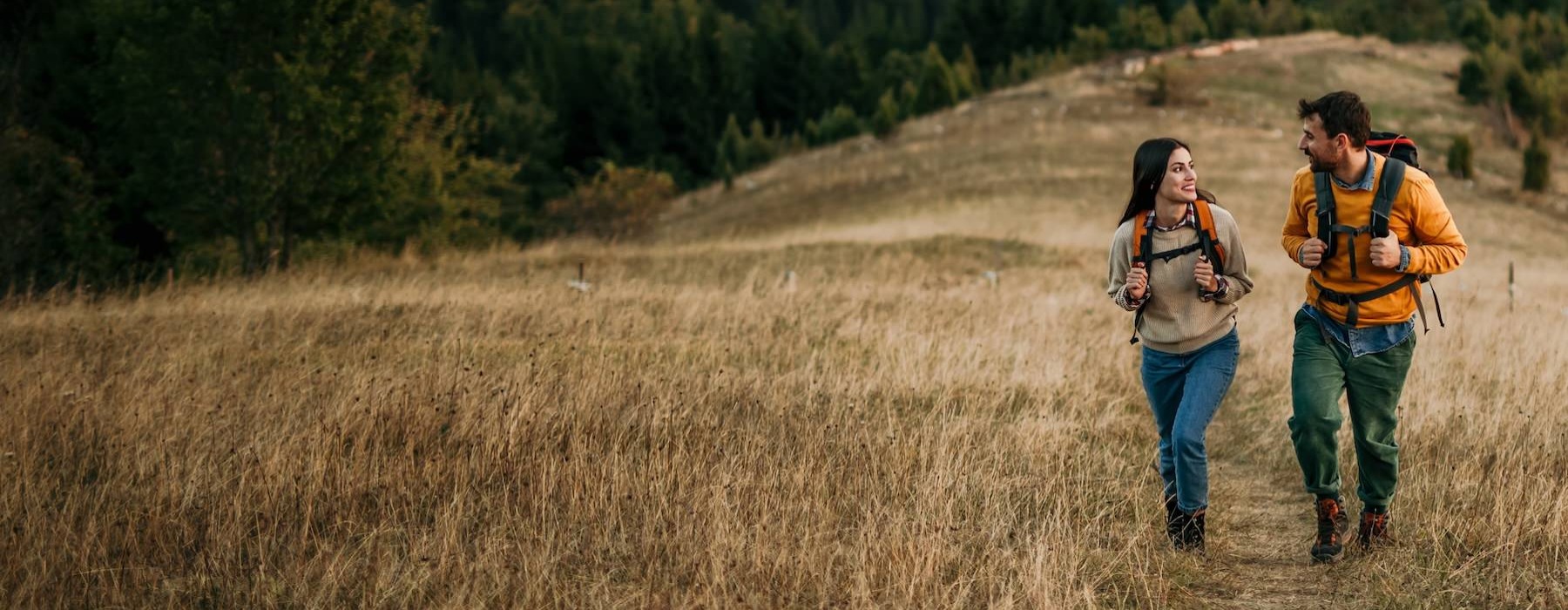 a man and a woman hiking