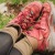 a persons feet with shoes on in a field